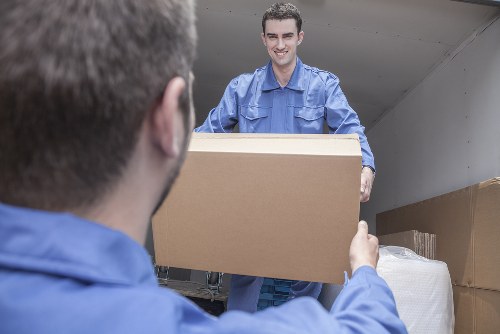 Man With Van Acton loading reusable and recyclable items for a sustainability-focused move