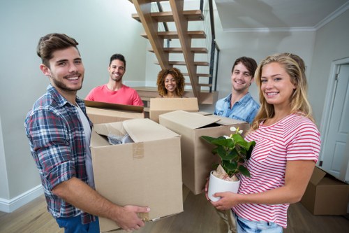 Careful loading of furniture during a house move in Acton