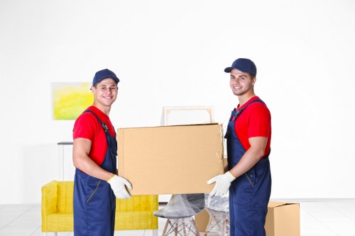 Removal truck and moving team handling access challenges in Acton