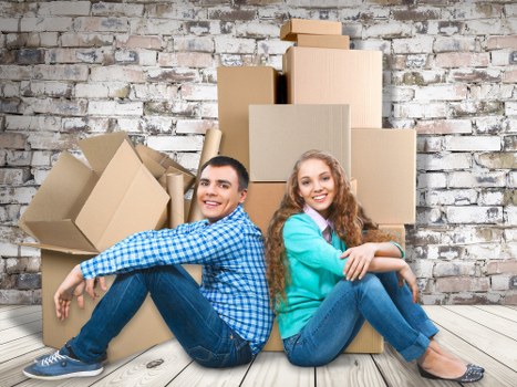 Packed household items ready for a move in Acton