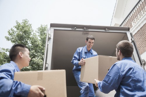 Checklist and packing materials prepared for a home move in Acton