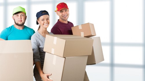 Moving boxes and furniture through a shared stairwell