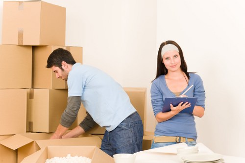 Customer arranging a van service with items ready for transport